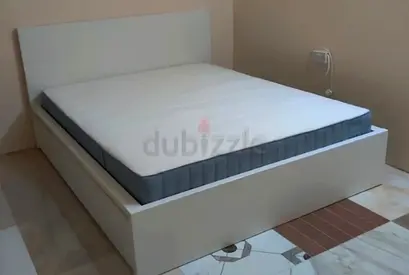 ikea malm king bed with ikea firm mattress   having 2 storage units under the bed