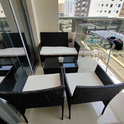 4-piece Outdoor Rattan Balcony Seating Set with Cushions with table