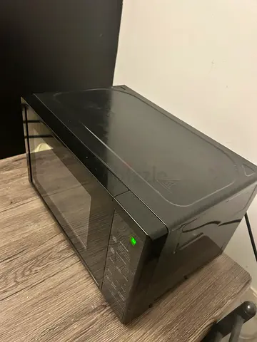 Clean and new Black Microwave Oven