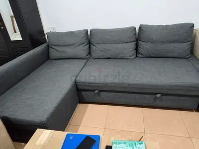 L-shaped grey fabric sofa with storage - excellent condition