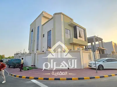 فيلا كورنر للبيع في الزاهية، عجمان | 6 غرف نوم ماستر | مساحة بناء 3,690 قدم² | روف واسع | موقع مميز على زاوية | 1.4 مليون درهم شامل رسوم التسجيل والتم