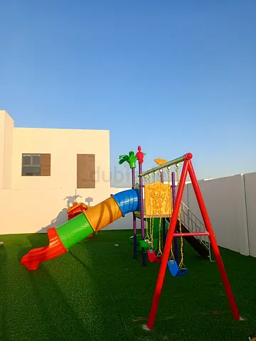 Outdoor kids playset with slide and swings - good condition