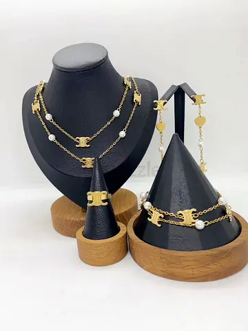 Gold-tone matching necklace, bracelet, ring and earrings set with pearls