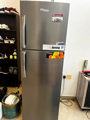 Used double-door refrigerator in stainless steel - good condition
