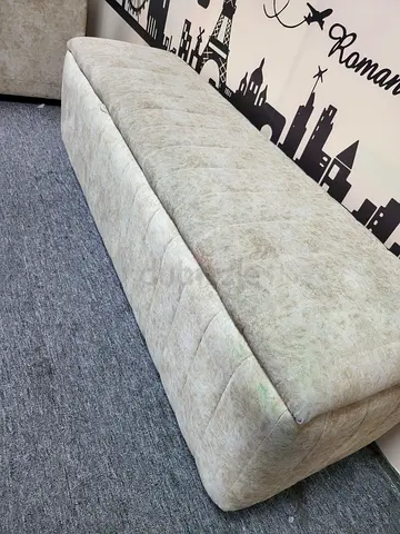Beige upholstered storage ottoman/bench - good condition