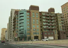 Master bedroom with attached bathroom and separate balcony at Al Nahda-01, Dubai.