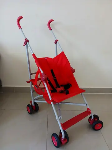 Lightweight red umbrella stroller - compact and foldable