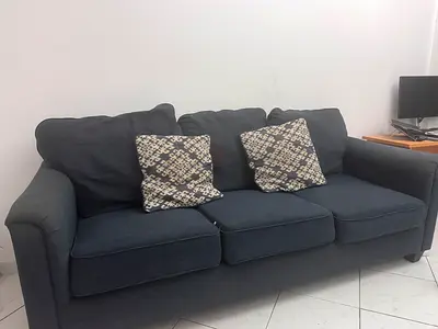 Dark grey 3-seater fabric sofa with cushions