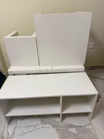 White modular TV unit / coffee table / side tables.