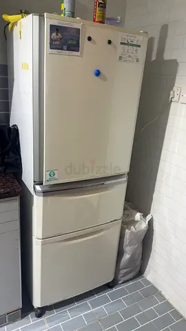 Second-hand white double-drawer refrigerator - good working condition