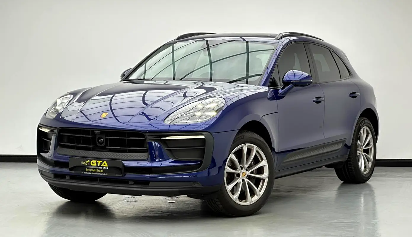 Porsche Macan 2023 — photo 1 of 17