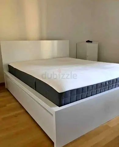 Ikea King size bed with mattress available in perfect condition