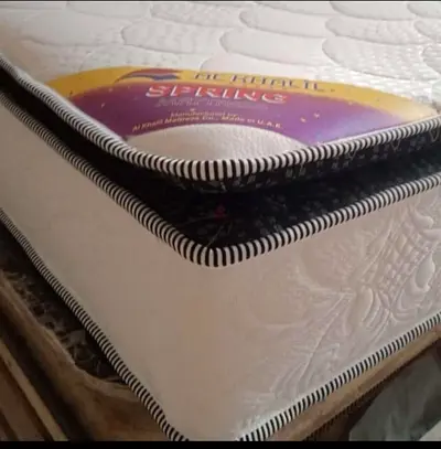Firm single mattress - barely used, good condition