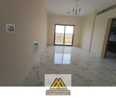 Two-bedroom apartment in Al Rawda 1, 3 bathrooms, central AC, AED 40,000 yearly, 4 installments, prime location.