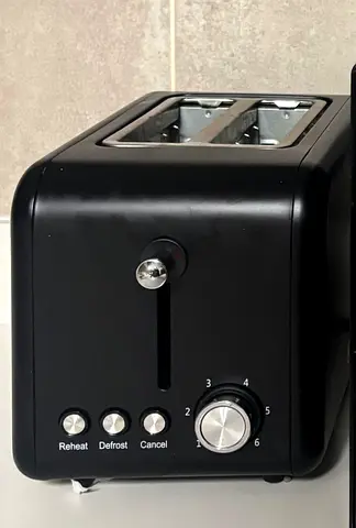 Black 2-Slice Toaster with Reheat/Defrost - Good Condition