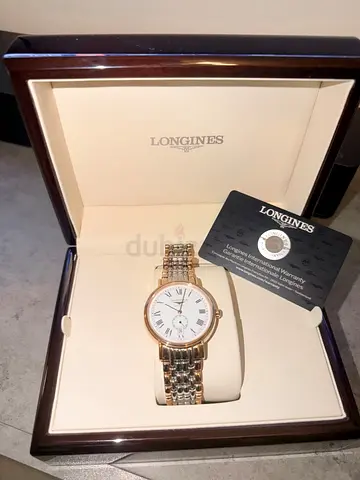 Longines mens two-tone automatic watch with box and 5 yrs warranty card
