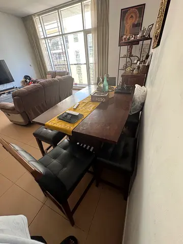 Solid Wood Dining Table with 4 Padded Chairs - Good Condition