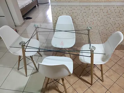 Glass Top Dining Table with 4 White Modern Chairs - Good Condition