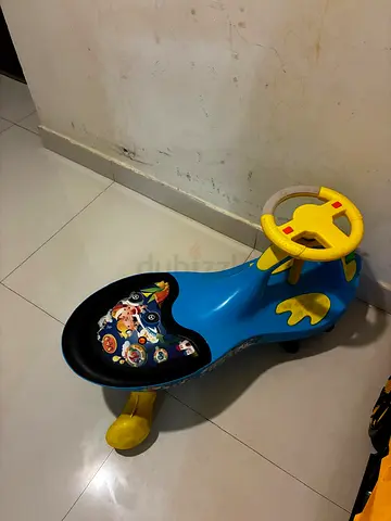 Kids Ride On Swing Car / Wiggle Car – Excellent Condition