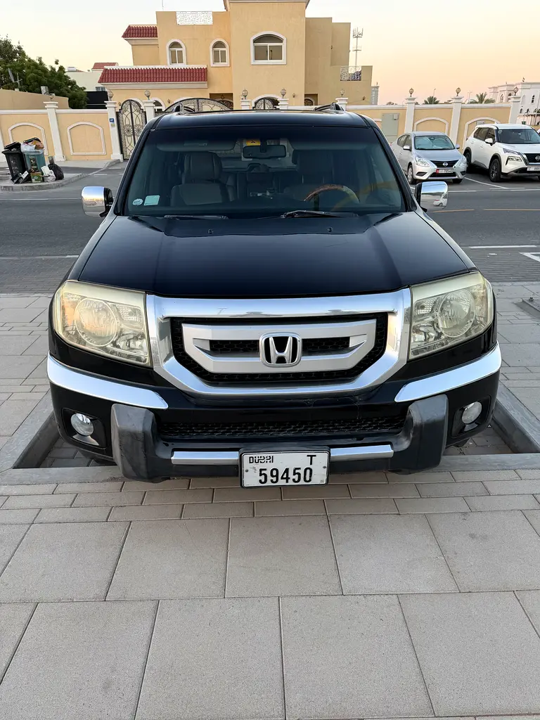 Honda Pilot 2009 — photo 1 of 15