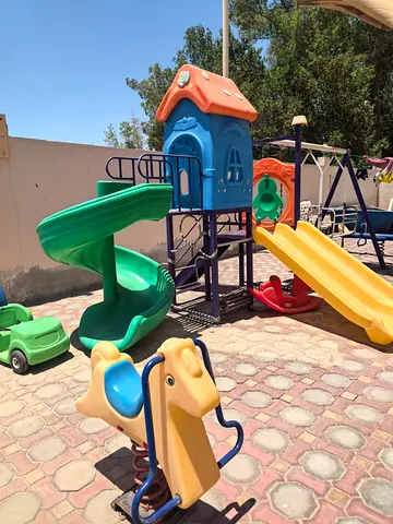 Used Outdoor Playset with Slides, Spiral Slide and Rocking Horse - Good Condition