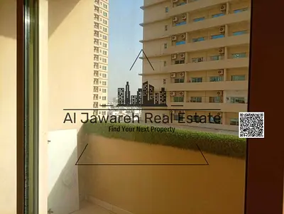 One-bedroom apartment with a living room, two bathrooms, and a balcony, plus parking, at a reasonable price and in a prime location in Al-Layliz Tower