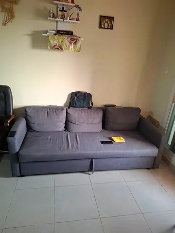 Grey 3-seater fabric sofa cum bed in good condition from IKEA