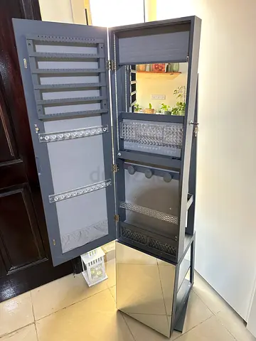 Tall freestanding jewelry cabinet with mirror and organized storage, led light options