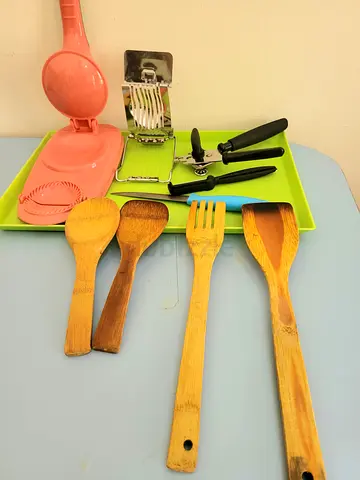 Mixed kitchen utensils set — wooden spoons, slicer, can opener and accessories with 2 flasks