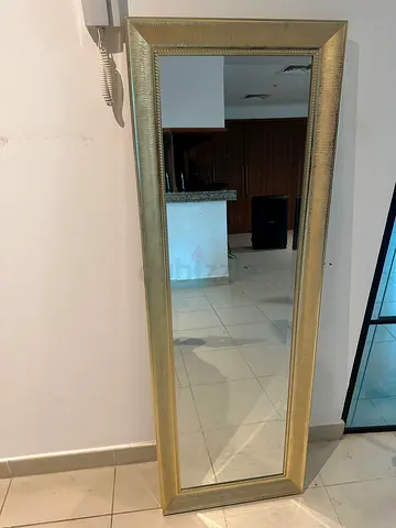 Mirror with golden frame