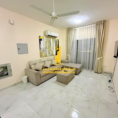 Furnished one-bedroom apartment for monthly rent in Ajman - Al Hamidiya - near Etisalat Center | Stylish and tidy furnishings | Including All bills