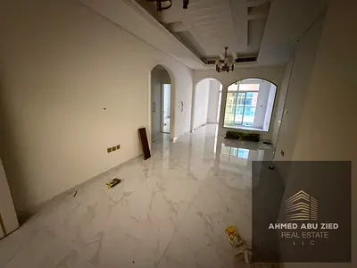 2BHK for annual rent in Al Muwaihat 3, spacious area, built-in wardrobes, one month free, balcony, gym, swimming pool, prime location, special price.