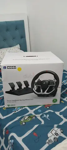 Gaming steering wheel for sale almost brand new with box and pedals price is negotiable