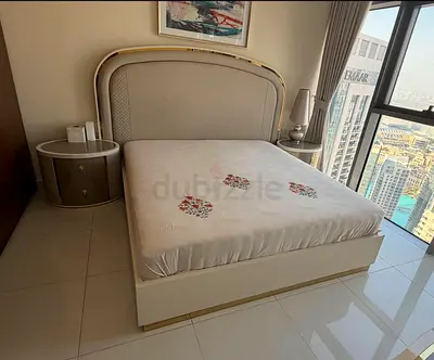 Queen size upholstered bed frame with headboard and matching bedside