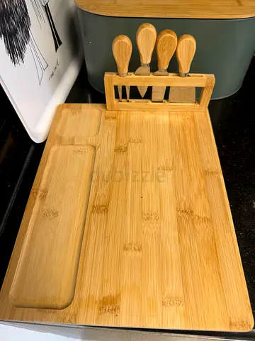 Bamboo cutting board with 4-piece knife set and built-in compartments