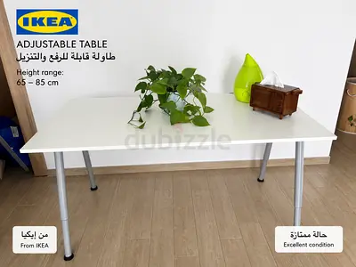 IKEA adjustable white table, height 65–85 cm, excellent condition