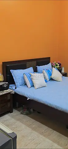 Queen wooden bed frame with headboard - good condition