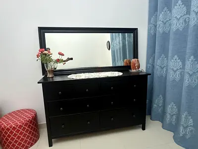 Solid Black Dresser with Mirror - 8-Drawer Chest in Good Condition
