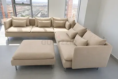 Scandinavian Corner Sofa A contemporary Scandinavian-inspired corner sofa with deep seating, soft cu