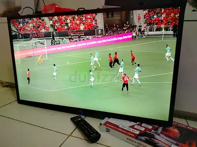 32 inch slim model TV with remote and wall bracket