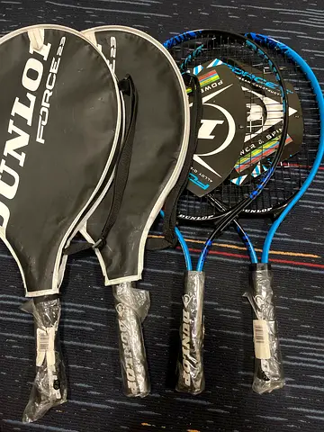 Set of 4 Dunlop tennis rackets with covers - new