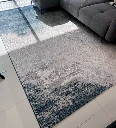 Modern abstract blue-gray area rug - excellent condition