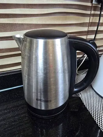 Super General Stainless Steel Electric Kettle (approximately 1.7–1.8L).