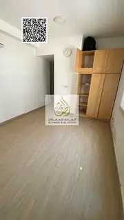 Two-bedroom apartment with a living room for annual rent in Al Rawda 1