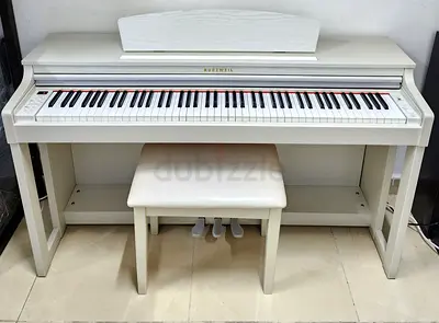 The Kurzweil M230 WH (White) is a spinet-style home digital piano combining a classic cabinet