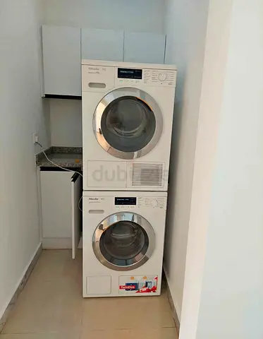 Stacked Miele Washer and Dryer set - Good working condition