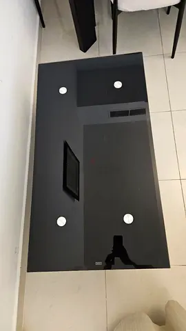 Sleek Black Glass Top Coffee Table