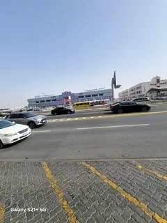 Shop for rent in Sharjah Abu Shagara two floor shop on the main road prime commercial location suita