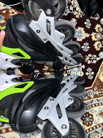 Used inline roller skates  (unisex ) size 44 — good working condition with safety gear