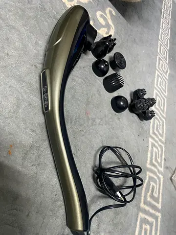 Handheld Electric Massager with Multiple Attachments and contains 12 modes